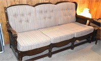 Wood frame sofa with ball feet and attractive