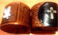 Two Beautiful hand carved leather bracelets