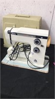 White sewing machine with case