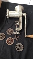 Vintage Keen Kutter meat grinder with attachments