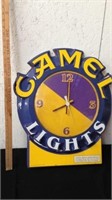 Camel wall clock has small damage
