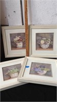 4 framed floral artworks