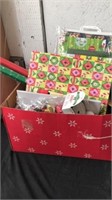 Christmas box with paper, bows, boxes