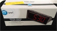 ONN Digital AM/FM clock radio looks new in box