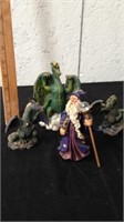 wizard and dragon statues
