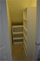 white bookshelves in pantry