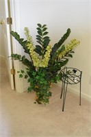 fern stand and artificial plant