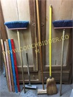 Vintage yard sticks, hardware store dustpan,brooms