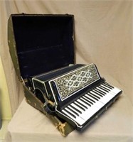 Accordion in Hard Case.