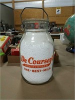 Vintage gallon milk bottle. De Coursey's