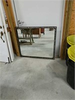 Large wall mirror measures 36 by 42.