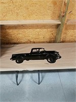Metal Chevrolet pick up wall hanging.