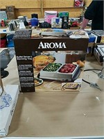 Aroma brand buffet server
Doubles as a warming