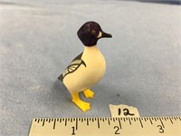 2.5" Ivory bird with purple head by Ted Mayac