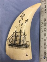 Peter Mayac scrimshawed whales, tooth.  One of the
