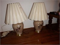 Pair of glass font table lamps with flying