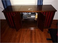 Olympic AM/FM console stereo and vinyl record