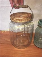 Old glass jar with wire bail