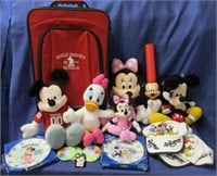 modern mickey mouse items in suitcase