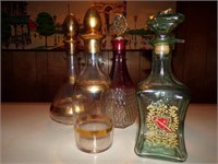 ASSORTMENT OF VINTAGE GLASS DECANTERS