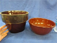 2 stone brown bowls (both have damage)