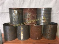 Lot of old large rusty tin cans for repurpose
