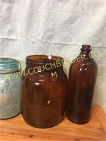 Old brown Purex bottle and brown glass jar