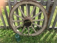 Antique iron wagon wheel w/ wooden spokes