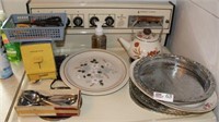 Miscellaneous on above and bottom drawer of Stove