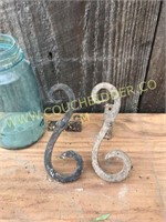 Pair of scrolled iron antique shutter tie backs