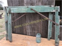 Green painted iron brace table legs