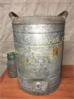 Old galvanized water cooler