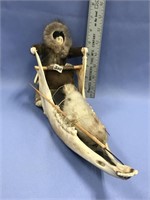 Caribou jaw sled with baleen and wood and has mush