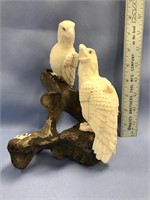 2 Carved ivory eagles, on a bone base, by Kwooshxk