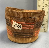Tlingit basket, cedar root, some damage to the lid