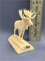 Bull moose, 3.25" tall, on walrus ivory base, 3" l