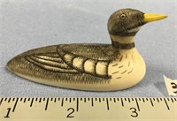 Yellow billed loon, carved walrus ivory by Peter M