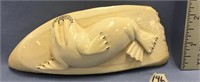 Huge whale's tooth relief carved with a walrus, to