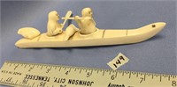 7.5" Ivory kayaker, stress crack in head of one of
