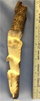 Pelowook fossilized ivory ice ax relief carved wit