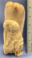Judy Pelowook 6" relief carved walrus on fossilize