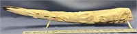 Carved fossilized  walrus tusk by Judy Pelowook, b
