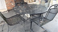 WROUGHT IRON TABLE W/ 4 CHAIRS   47"