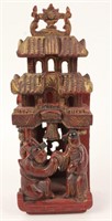 CHINESE RED CARVED WOODEN FIGURINE