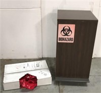 Biohazard waste bin with box of bags