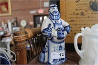 BLUE AND WHITE FIGURAL DECANTER BOTTLE