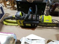Ryobi 40 volt 14 inch chainsaw with charger.