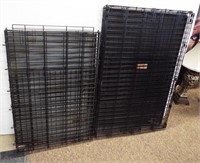 (2) Dog cages. One large and one X Large.