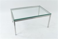 MID-CENTURY ALUMINUM AND GLASS COFFEE TABLE