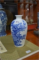 Chinese blue & white glazed vase with prunis